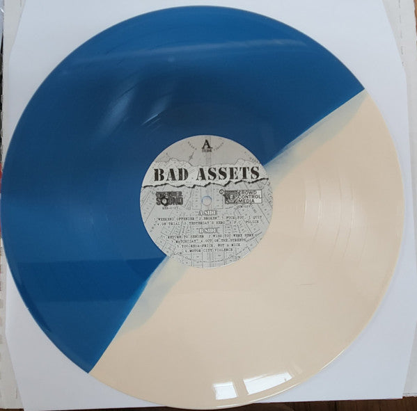 BAD ASSETS ‎– On Trial (White / Blue Half & Half Vinyl)